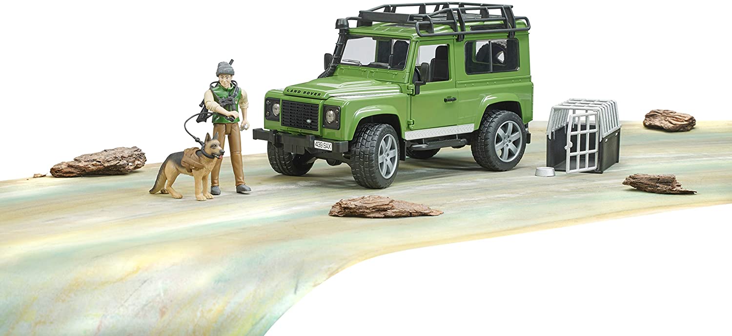 BRUDER LAND ROVER DEFENDER WITH FORESTER AND DOG