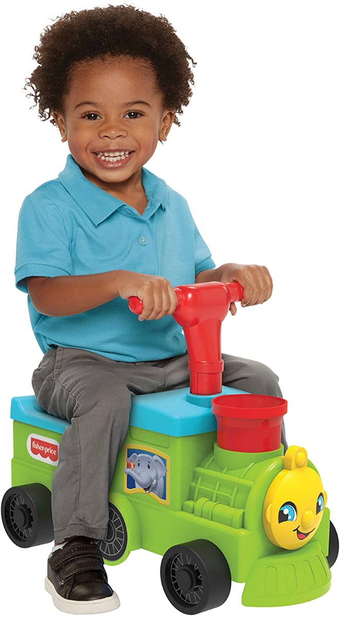 FISHER PRICE TOOTIN RIDE ON TRAIN