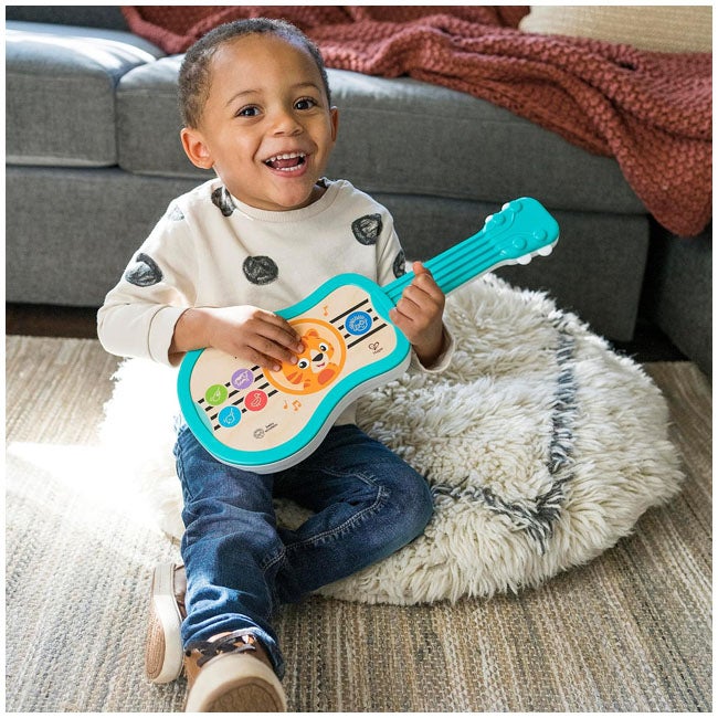 BABY EINSTEIN BY HAPE SING AND STRUM MAGIC TOUCH UKULELE