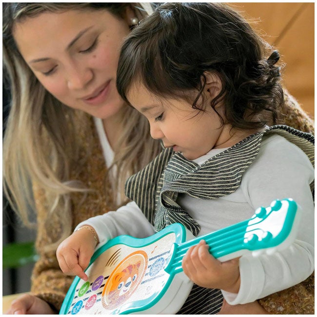 BABY EINSTEIN BY HAPE SING AND STRUM MAGIC TOUCH UKULELE